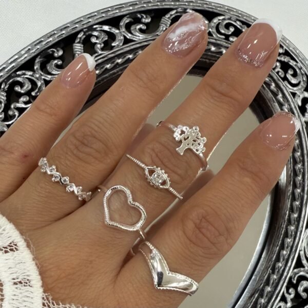 a a kit x 5 anillos plata mod K