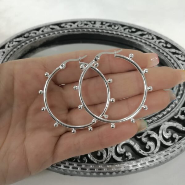 argollas con bolitas