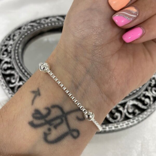 a a pulsera veneciana con bolitas