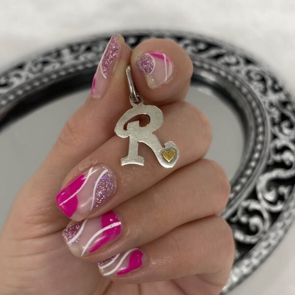 Dije inicial R